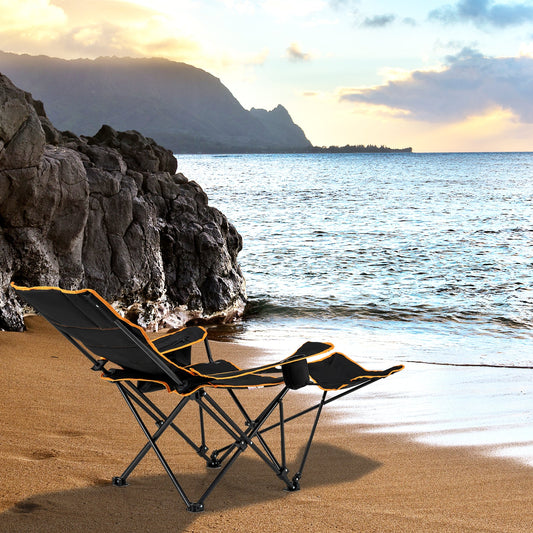 Folding camping chairs with footrests and carry bags by GemGear black/orange trim on sand on Tampa Home & Garden Store