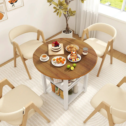 Folding round drop-leaf table with storage shelf, wood top and white legs, four beige chairs on Tampa Home & Garden Store