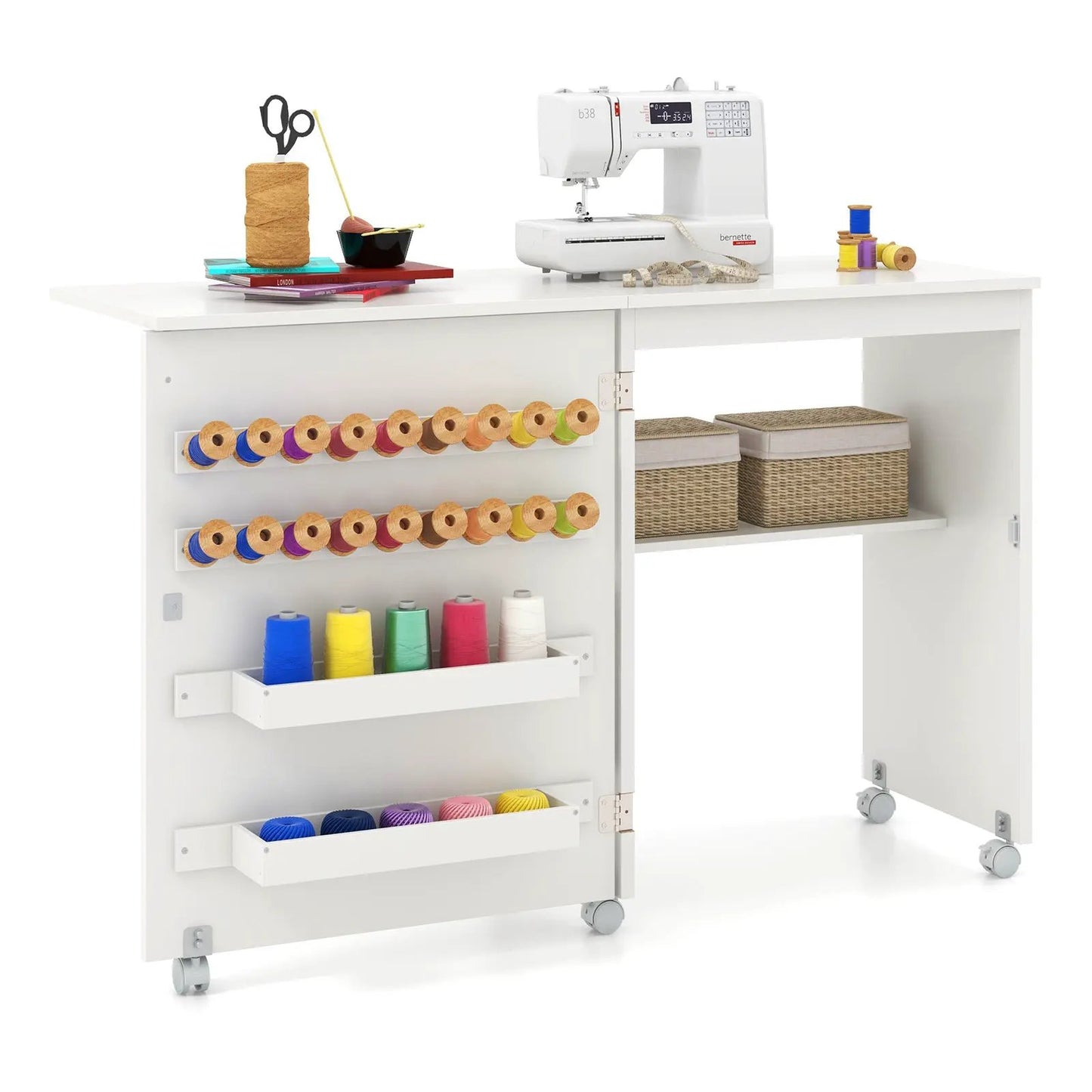 DirectDeals folding sewing table with five wheels; top sewing machine, spools left, baskets right on Tampa Home & Garden Store