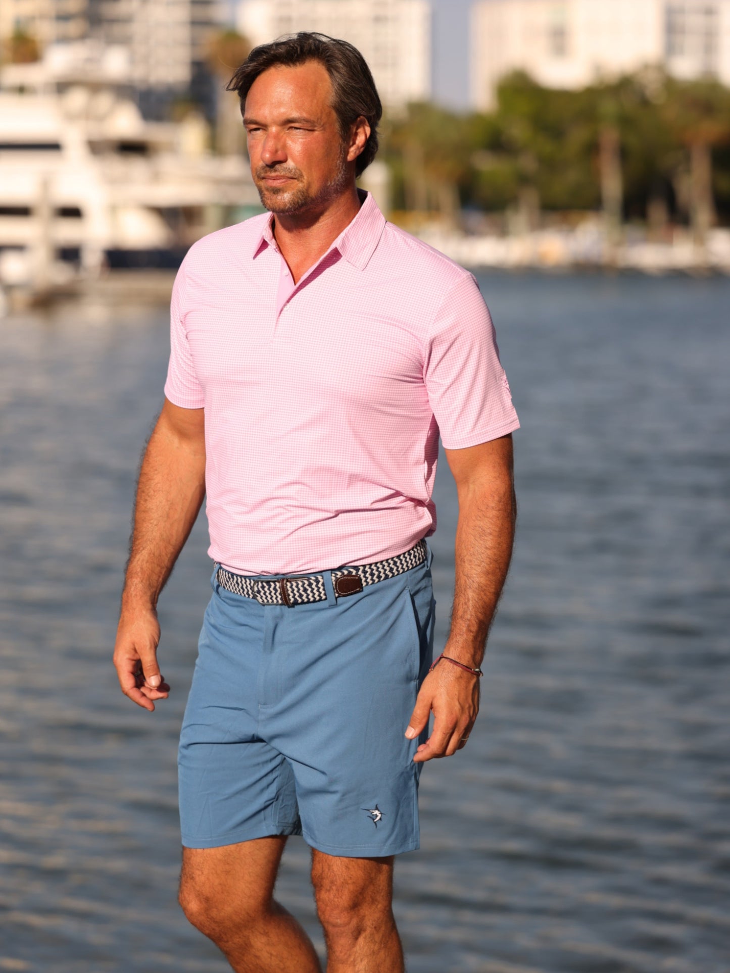 Freeport Short Effortless Performance shorts by White Water Life in blue, worn seaside on Tampa Home & Garden Store