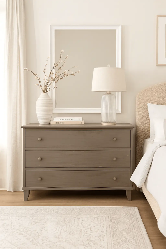 Frier Chest dresser in taupe with four drawers; bold geometric silhouette in a neutral bedroom on Tampa Home & Garden Store