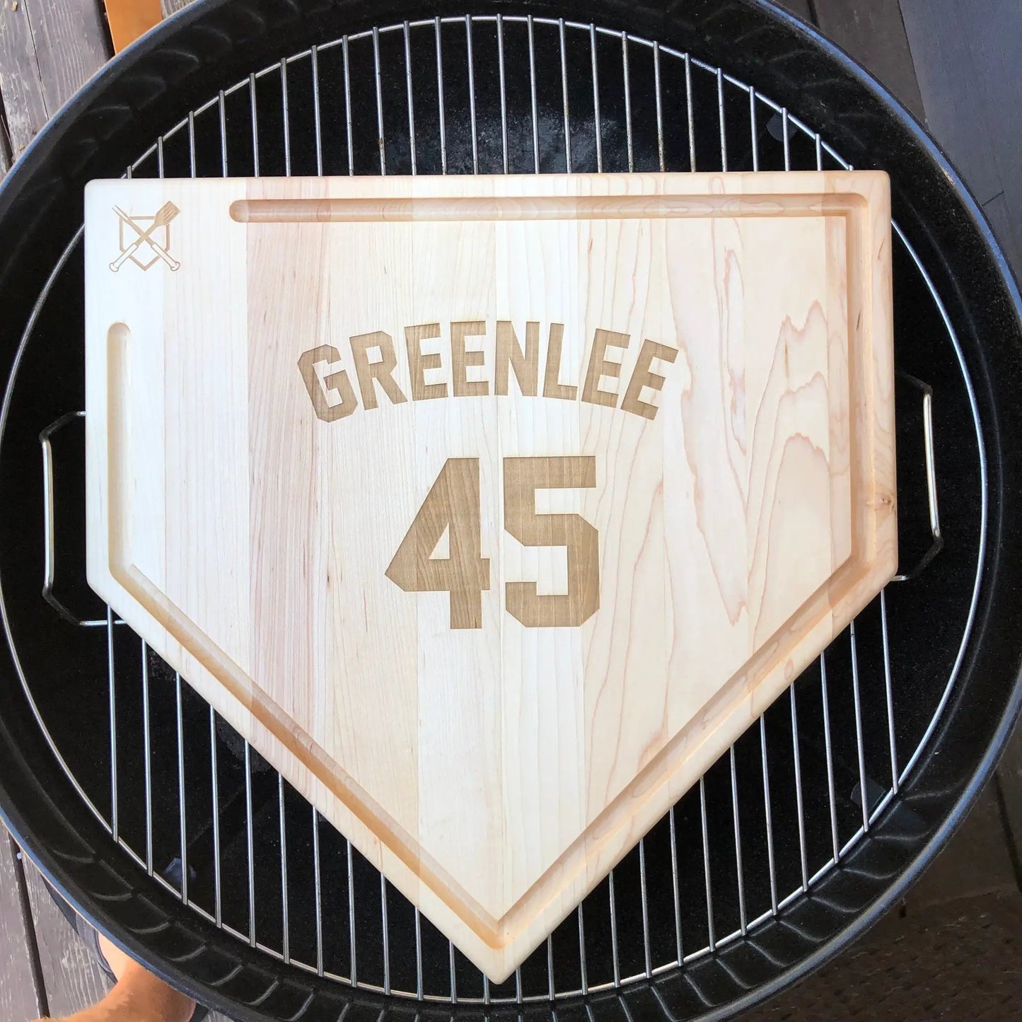 Home plate cutting board with trough, natural wood, Greenlee engraving logo on Tampa Home & Garden Store