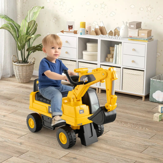 Licensed Caterpillar kids ride-on digger yellow with CAT logo; child riding indoors on Tampa Home & Garden Store