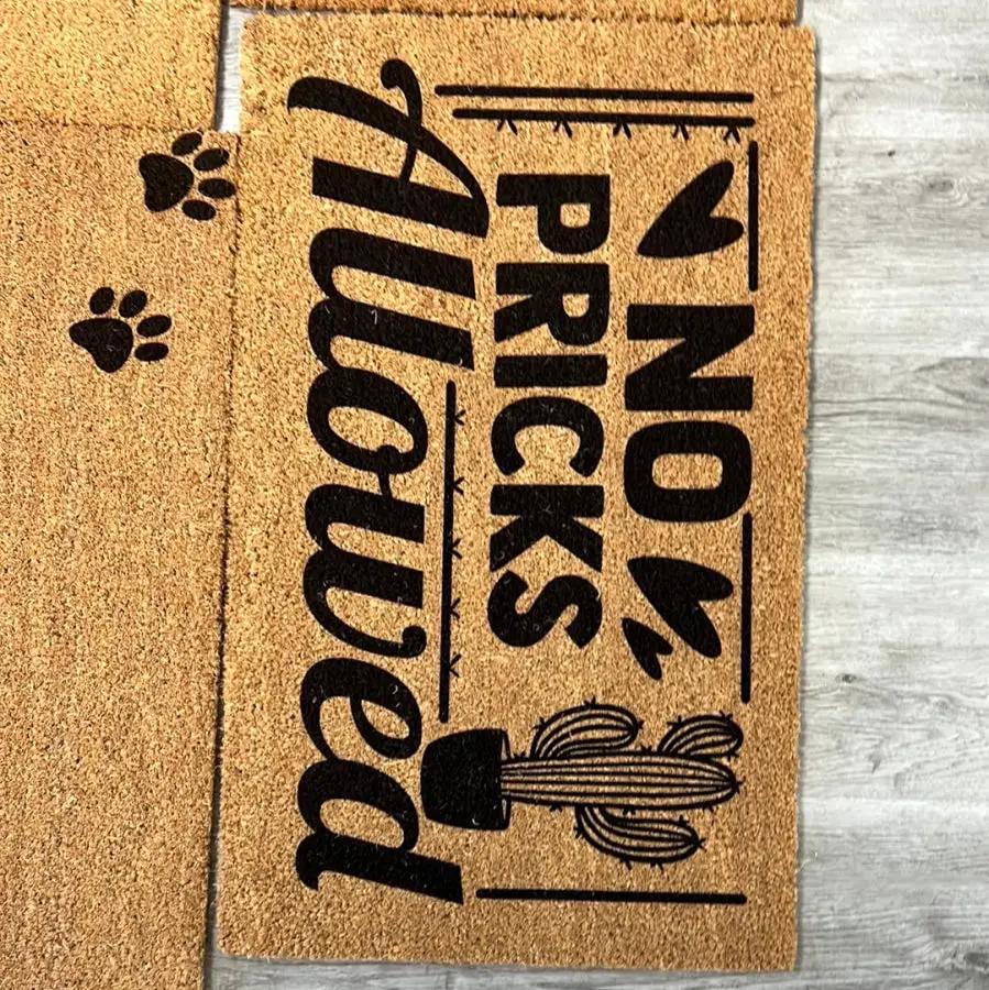 No Pricks Allowed Coir Door Mat with Slip Backing, with black text and cactus graphic on Tampa Home & Garden Store