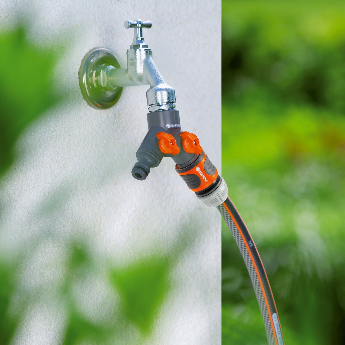 Gardena Twin-Tap Connector 26,5 mm G 3/4 watering hose splitter with orange handles on Tampa Home & Garden Store