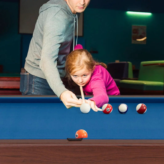 48 inch pool table with blue felt and rails, a man and child playing with full ball set on Tampa Home & Garden Store