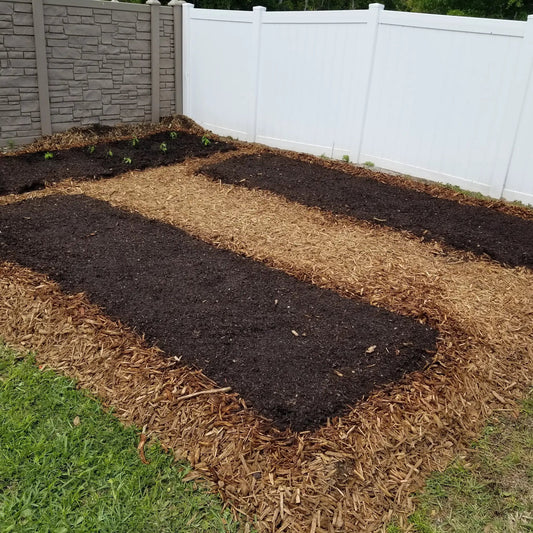 Cover weeds and grass before you build your no till garden. Easy roll of paper instead of collecting cardboard for no till gardening.