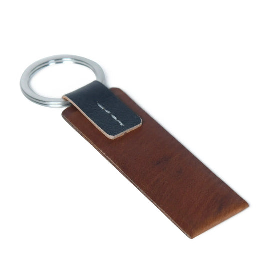 Genuine leather keychain with metal ring and navy stitched strap on brown leather base on Tampa Home & Garden Store