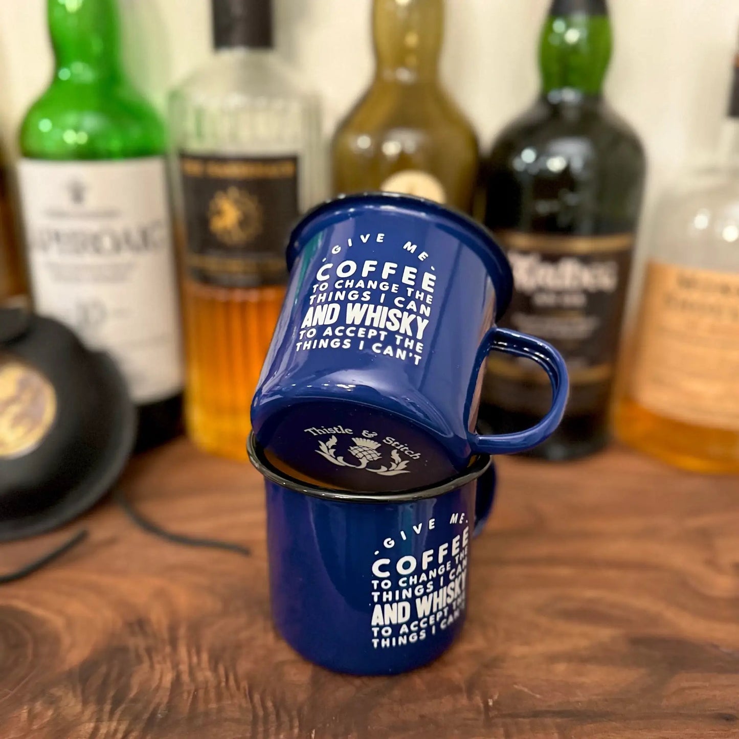 Blue enamel mug Thistle & Stitch with white text Give me coffee to change the things I can't on Tampa Home & Garden Store