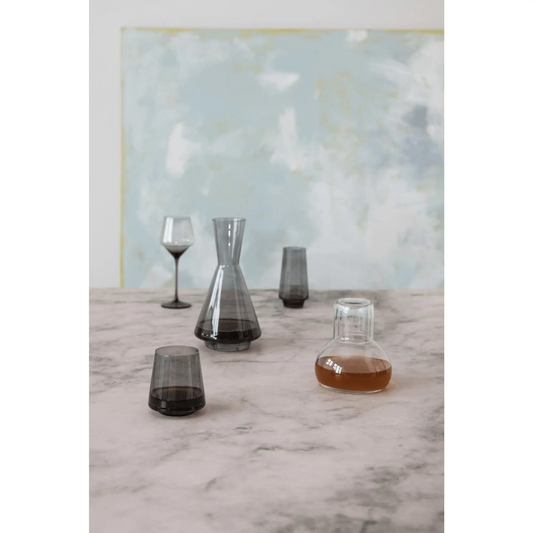 Smoke color glass decanter by White Cliff Studio; gray finish on marble table on Tampa Home & Garden Store