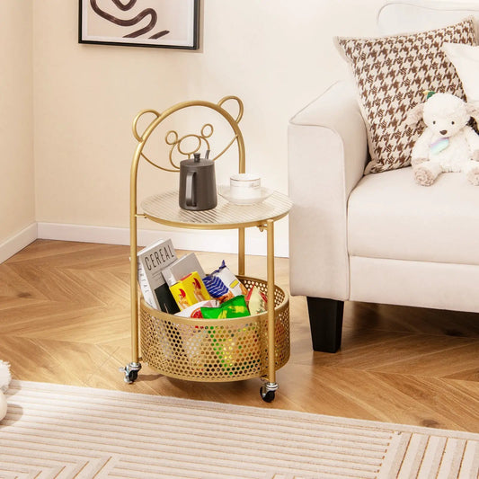 Gold metal sofa side table with lockable wheels and round perforated shelf beside beige sofa on Tampa Home & Garden Store
