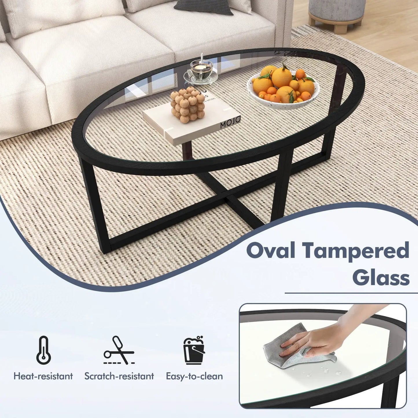 Oval tempered-glass coffee table with cross-base black metal frame on Tampa Home & Garden Store