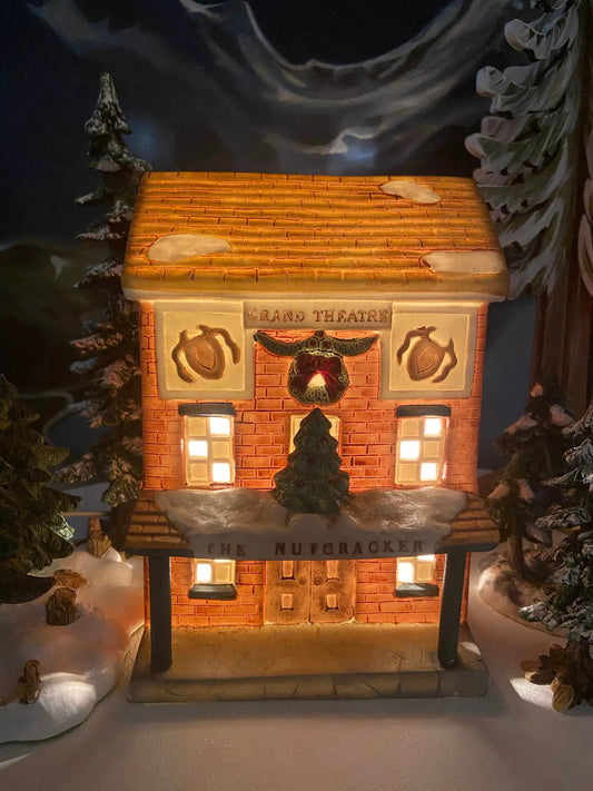Grand Theatre Nutcracker Christmas Village House brick facade, warm glowing windows, snow roof on Tampa Home & Garden Store