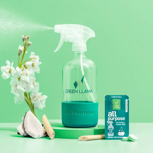 Green Llama All-Purpose Cleaner Starter Kit clear spray bottle on teal base with refill on Tampa Home & Garden Store