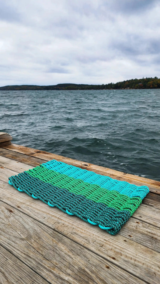 Green Ombre Lobster Rope Front Door Mat by Little Salty Rope in coastal teal hues on Tampa Home & Garden Store