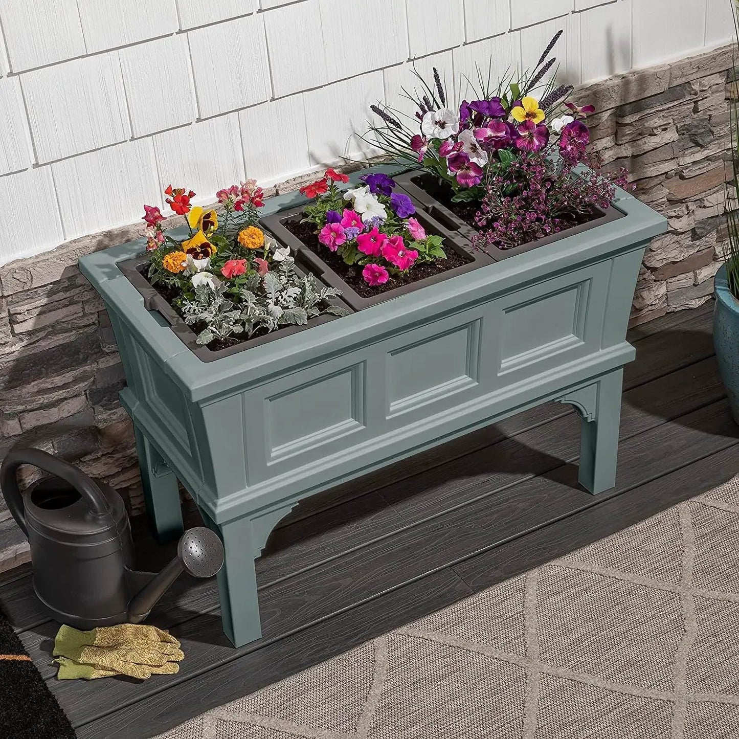 Green rectangular raised planter bed with 3 trays and colorful flowers by HomePacific on Tampa Home & Garden Store