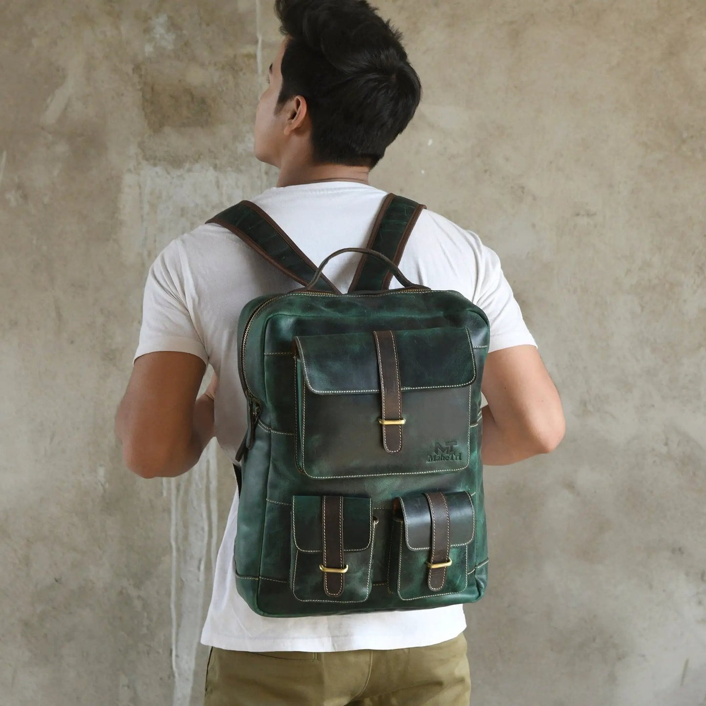 Greenfield Leather Backpack with Laptop Sleeve, green leather with brown straps and pockets on Tampa Home & Garden Store