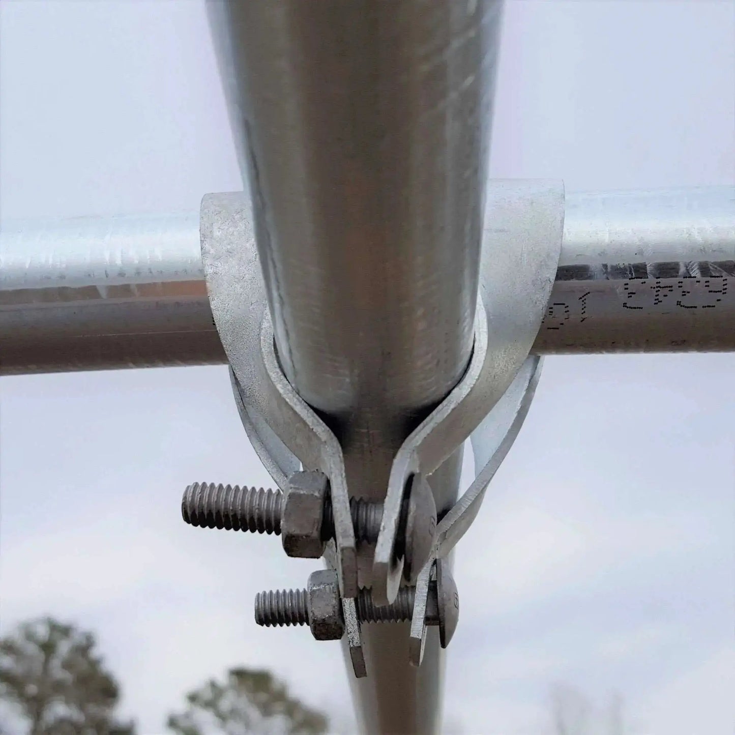 Greenhouse cross connector for 1 3/8 in rails, galvanized steel hardware, close-up joint on Tampa Home & Garden Store
