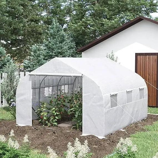 Greenhouse kit with white PE cover and steel frame, curved arch roof in backyard garden on Tampa Home & Garden Store