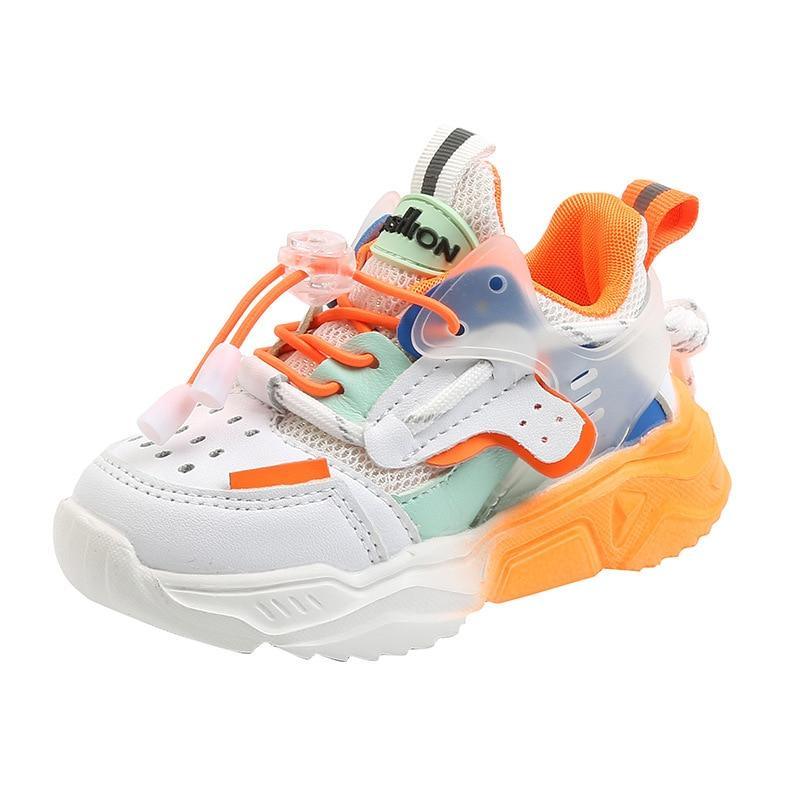 Stevvex toddler sneakers with white mesh upper and orange sole on Tampa Home & Garden Store