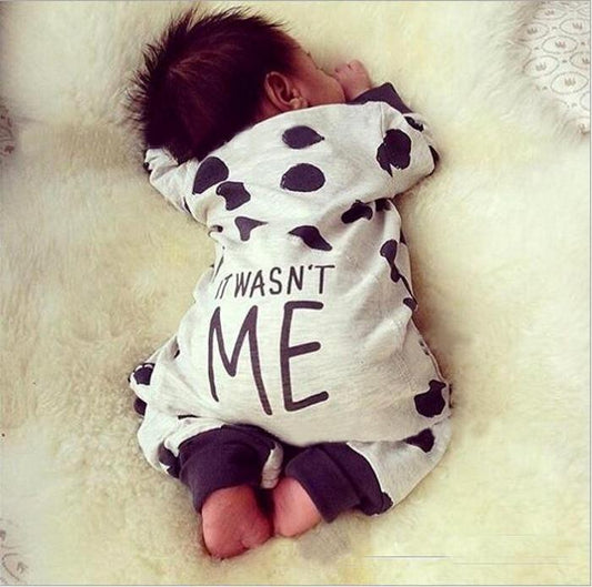 Stevvex baby long-sleeved dot jumpsuit with black polka dots and It Wasnt Me print on Tampa Home & Garden Store