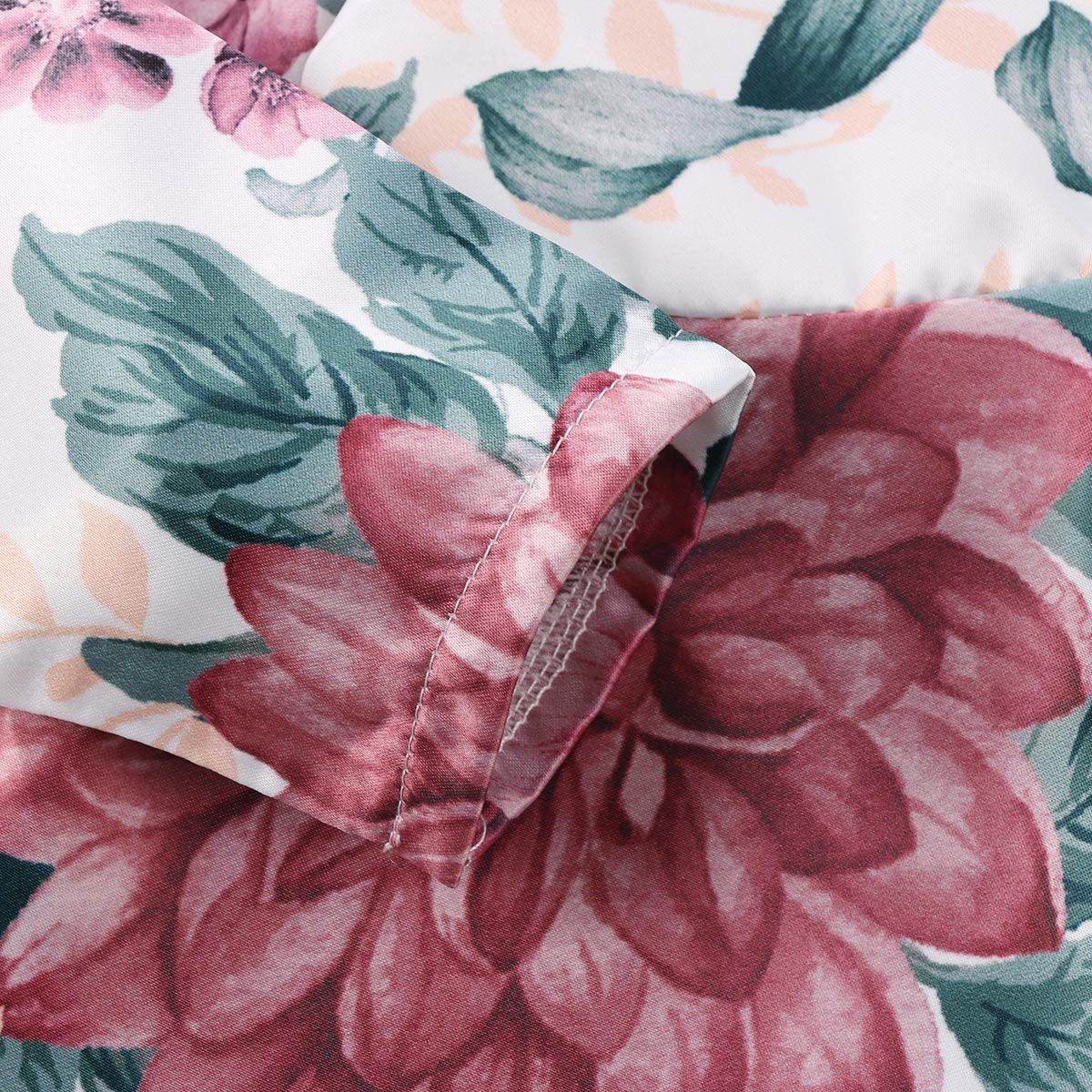 Newborn baby girls floral dress close-up in pink and teal print with long sleeves on Tampa Home & Garden Store