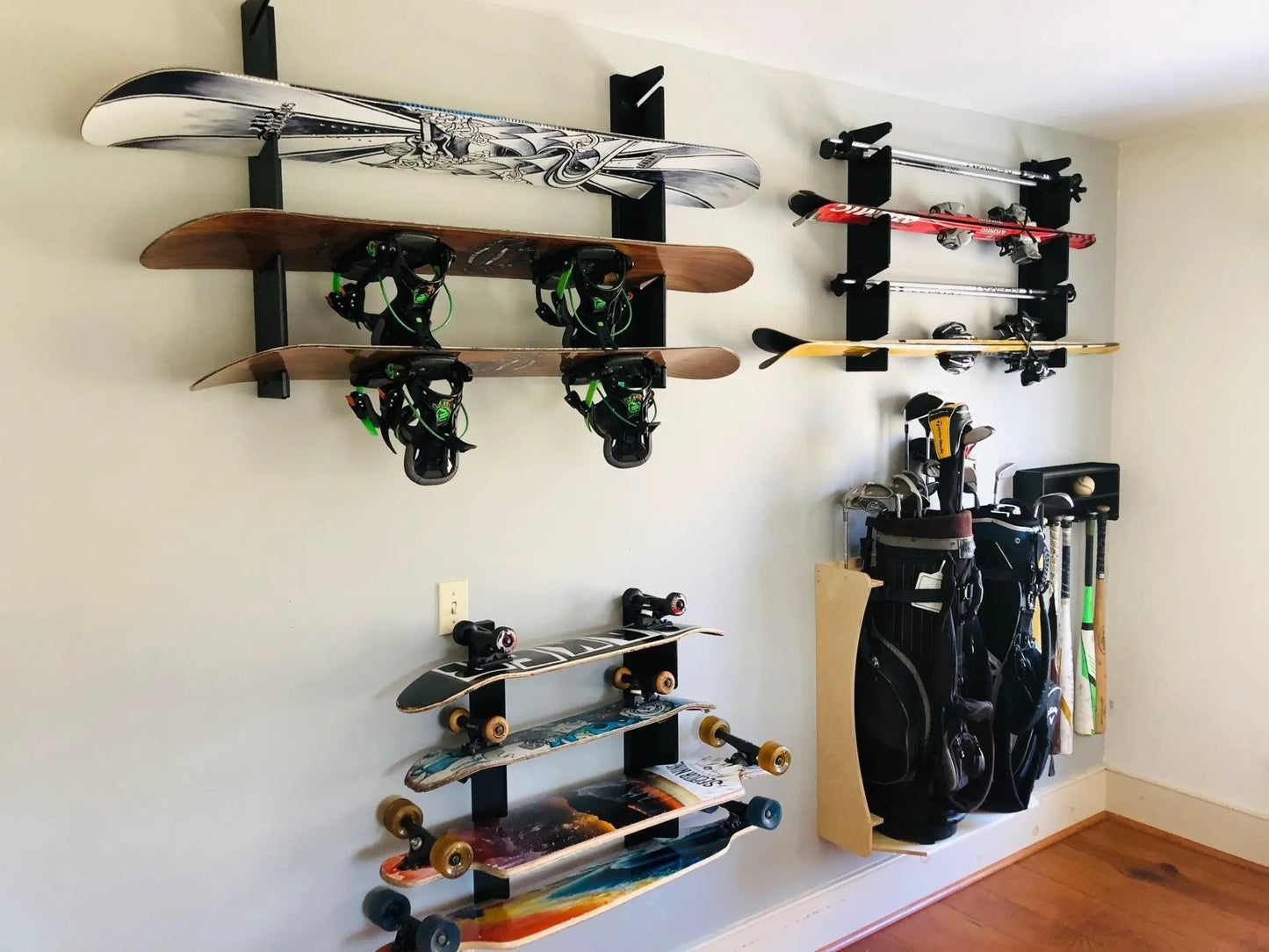HangThis Up Snowboard Rack, black wall-mounted garage storage that holds boards on Tampa Home & Garden Store