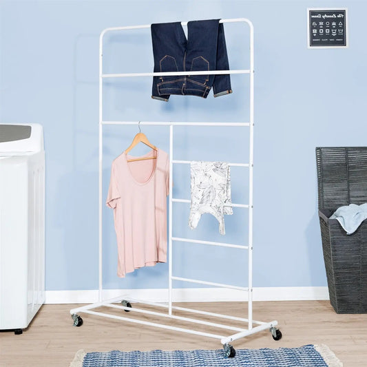 White rolling laundry drying rack on wheels with jeans on top bar and towel on lower bar on Tampa Home & Garden Store