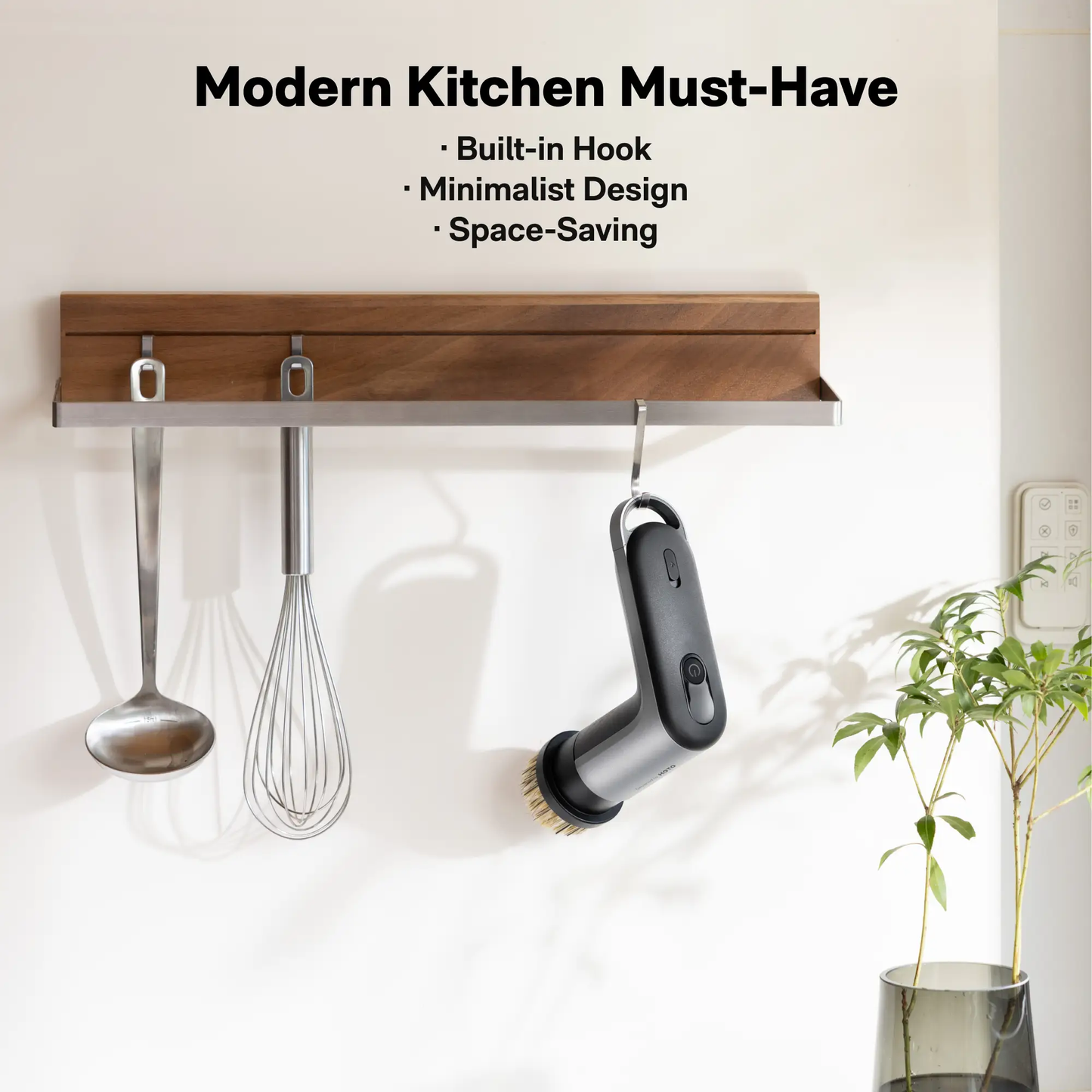 HOTO Grip Cordless Spin Scrubber black/gray with round brush head, hanging on wall rack on Tampa Home & Garden Store