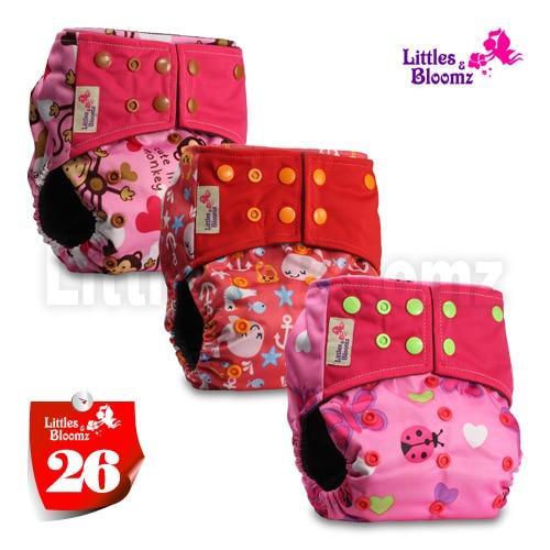 Stevvex cloth pocket nappies 3-pack with pink prints; Littles & Bloomz logo visible on Tampa Home & Garden Store