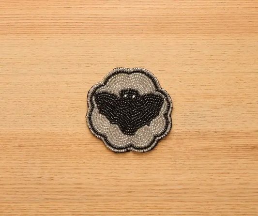 Halloween Bat Beaded Coaster with cream beads and black bat silhouette, velvet backing on Tampa Home & Garden Store