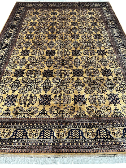 Hand-knotted Afghan Bukhara wool rug with beige field and geometric design 8ft4in x 11ft10in on Tampa Home & Garden Store