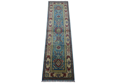 Rugistan hand-knotted Afghani Kazak wool runner in blue with ornate multicolor border on Tampa Home & Garden Store