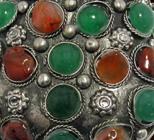 Kuchi tribal pouch pendant necklace with green and orange stones in silver rope-edged bezels on Tampa Home & Garden Store