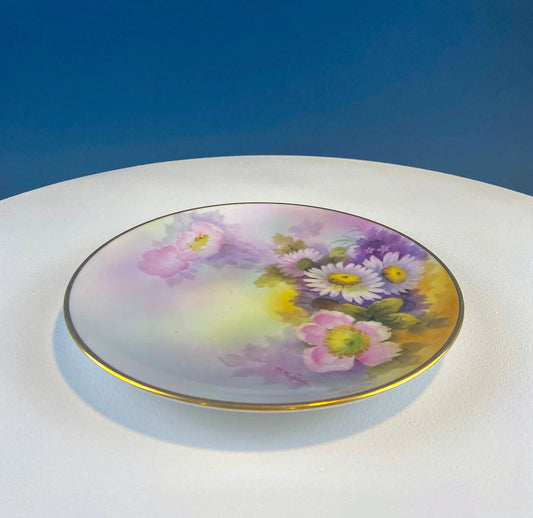Hand painted decorative plate with tea roses and daisies, white background, gold rim on Tampa Home & Garden Store