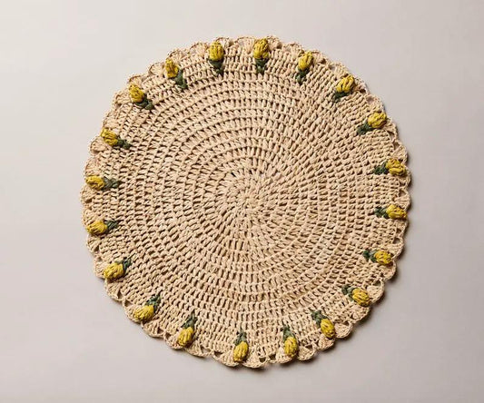 Handmade Tulip Placemat in raffia crochet, round beige mat with yellow tulip accents on edge on Tampa Home & Garden Store