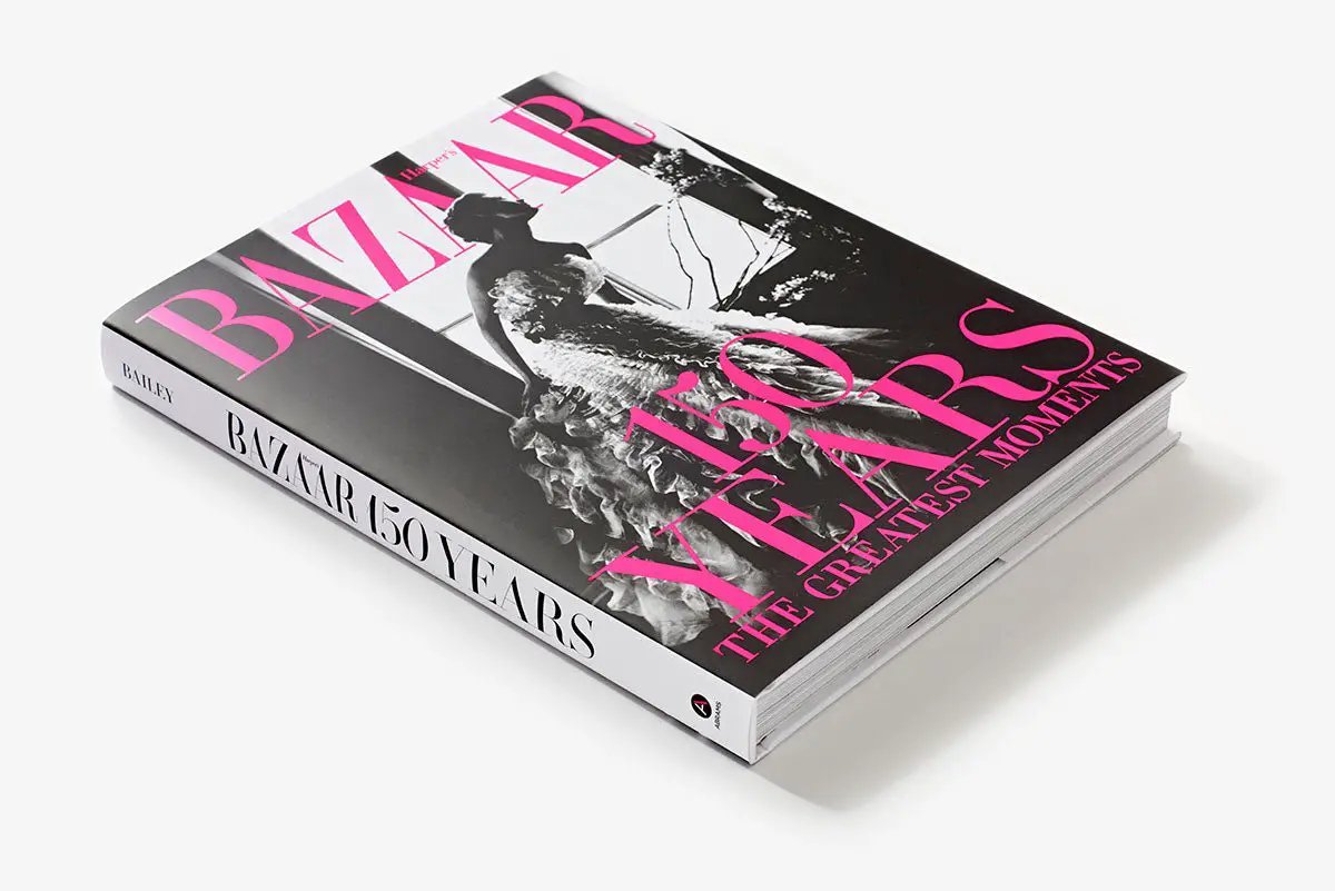 Harpers Bazaar 150 Years Celebration hardcover fashion book with pink title and grayscale cover on Tampa Home & Garden Store