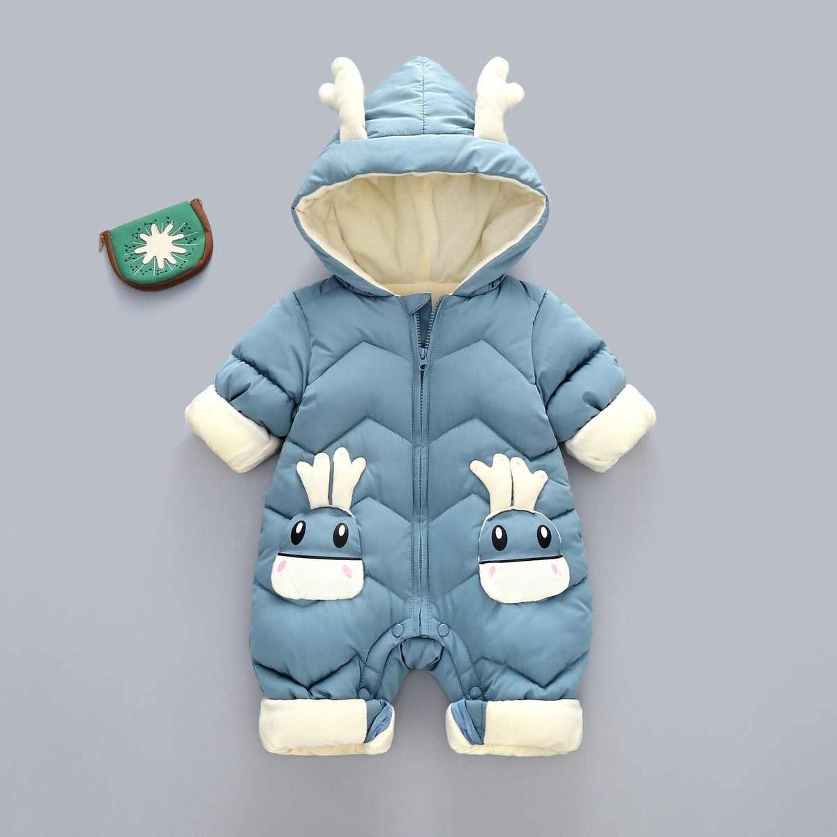 Baby blue quilted hooded snowsuit by Stevvex with cream lining and white plush ears on Tampa Home & Garden Store