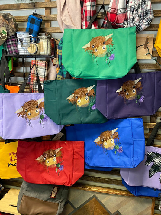 Highland Coo totes by Thistle & Stitch with embroidered cow and thistle 7 items on Tampa Home & Garden Store