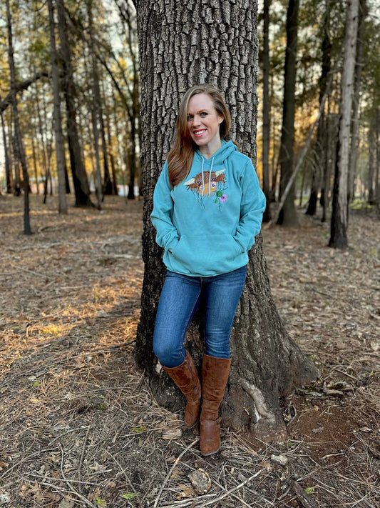Highland Coo embroidered unisex hoodie in teal fleece by Thistle & Stitch on Tampa Home & Garden Store