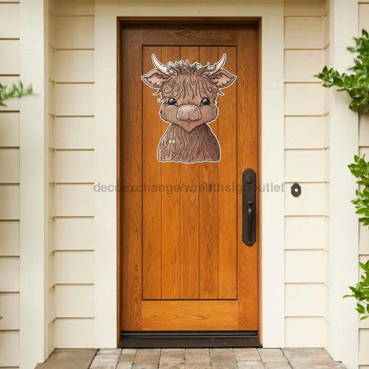 Highland Cow Door Hanger 22in wood sign with DecoExchange branding on brown wood door on Tampa Home & Garden Store