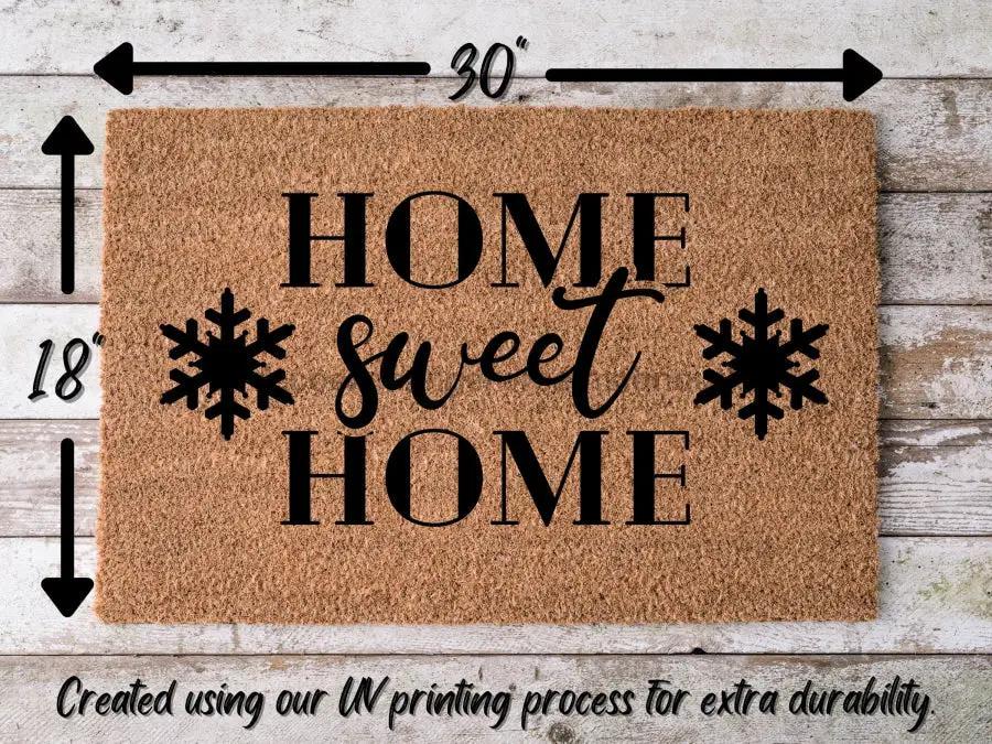 Door mat Home Sweet Home Christmas natural coir with black lettering and snowflakes DecoExchange on Tampa Home & Garden Store