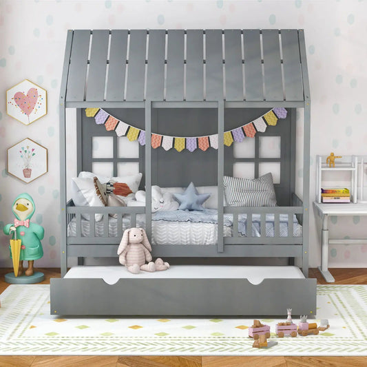Gray twin size house bed frame with trundle and colorful bunting decor in a kid's room on Tampa Home & Garden Store
