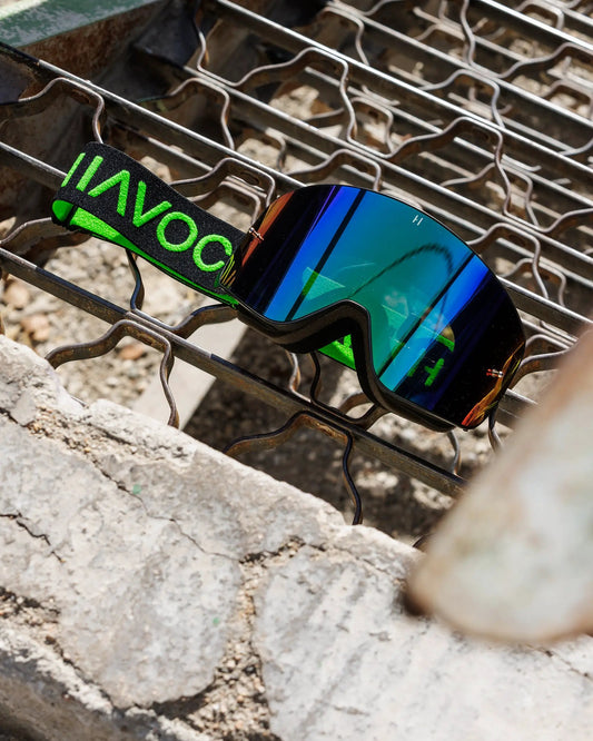 Havoc Infinity racing goggles with mirrored blue lens and neon green strap on Tampa Home & Garden Store