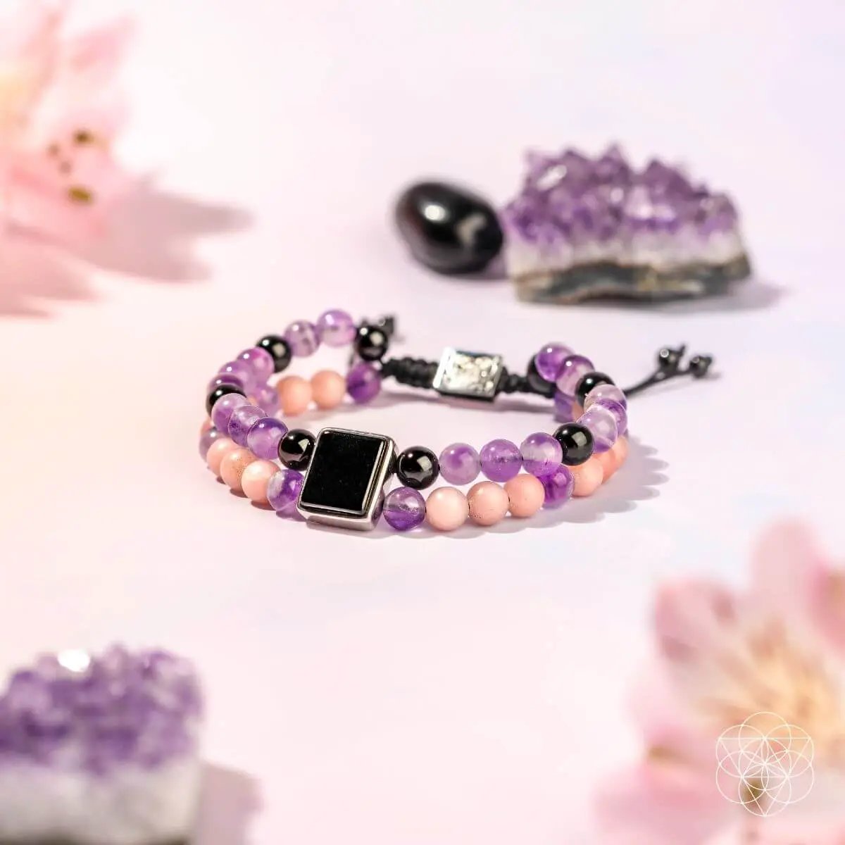 Two-strand bracelet set Illuminating Eye of Horus beads in purple pink with silver clasp on Tampa Home & Garden Store