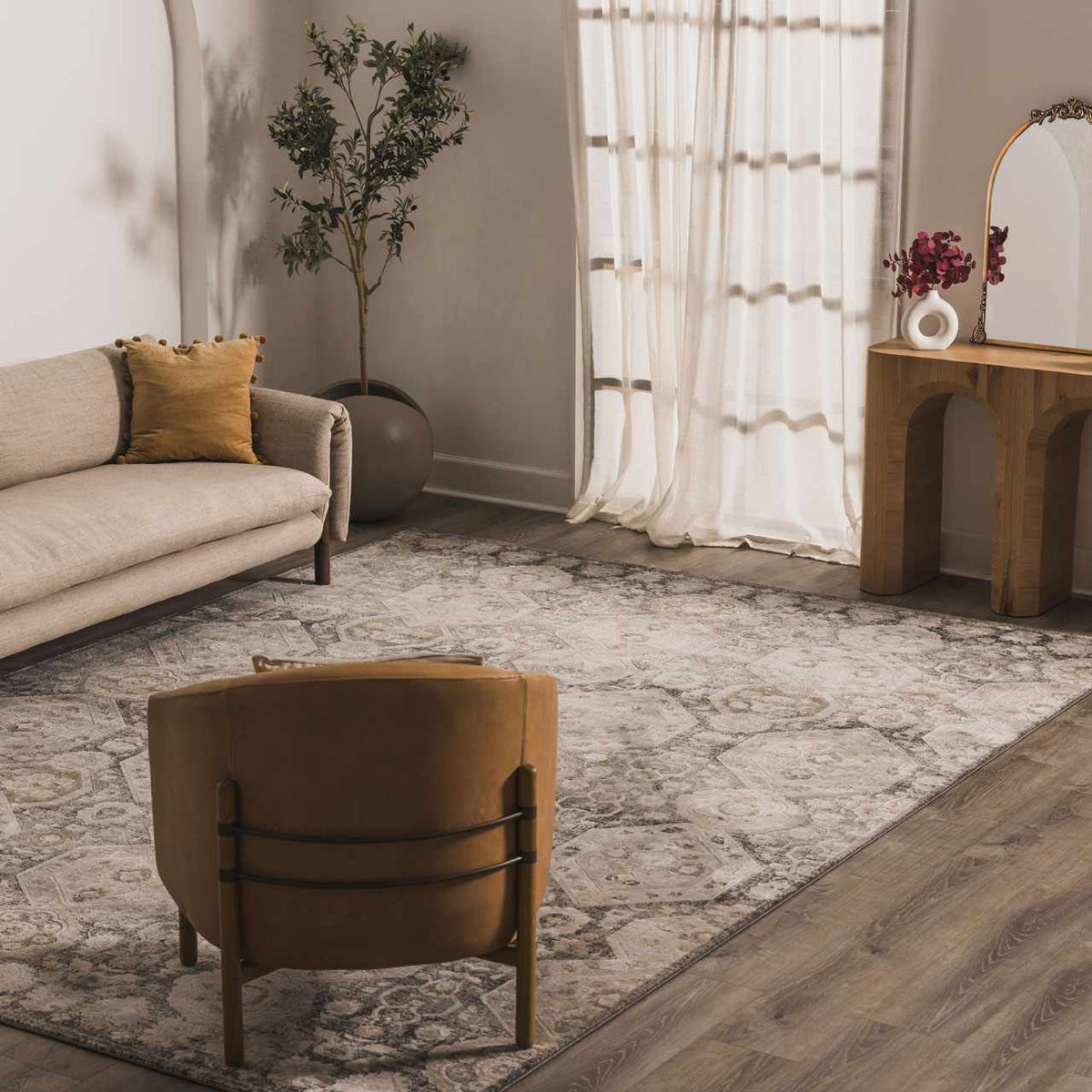 Minoa Area Rug by Boutique Rugs in muted gray ivory with a vintage medallion pattern on Tampa Home & Garden Store