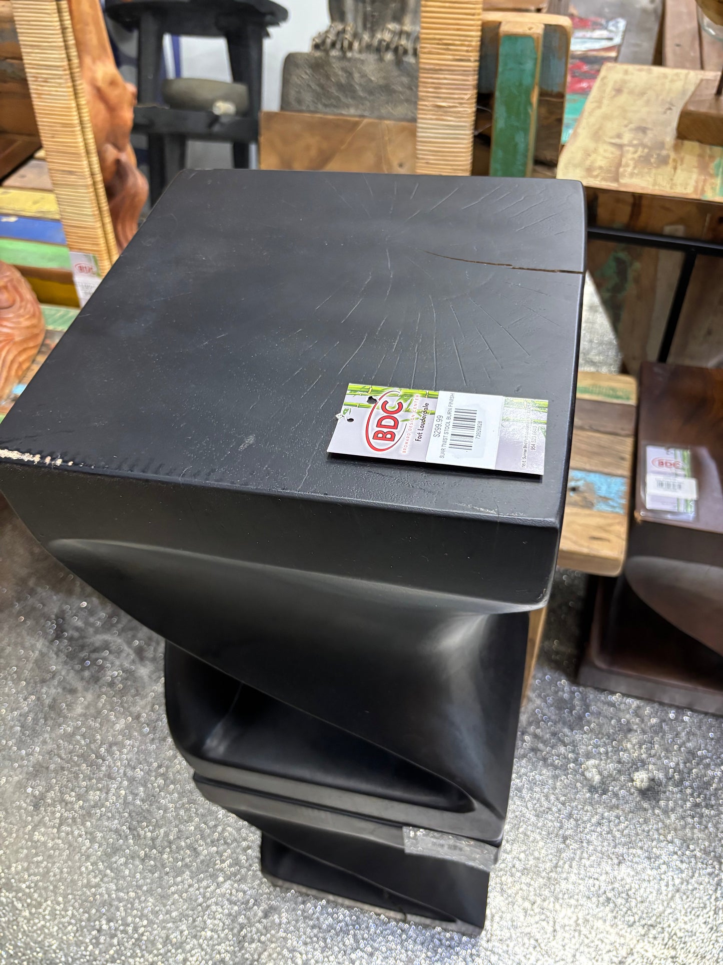 SUAR TWIST STOOL BURN FINISH black matte seat with BDC tag visible on Tampa Home & Garden Store