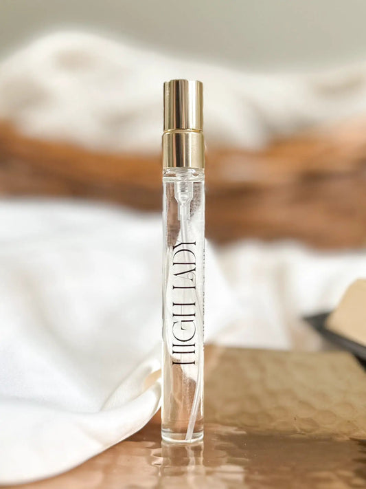 High Lady Travel Perfume Saffron Raspberry Zest rollerball bottle with clear glass and gold cap on Tampa Home & Garden Store
