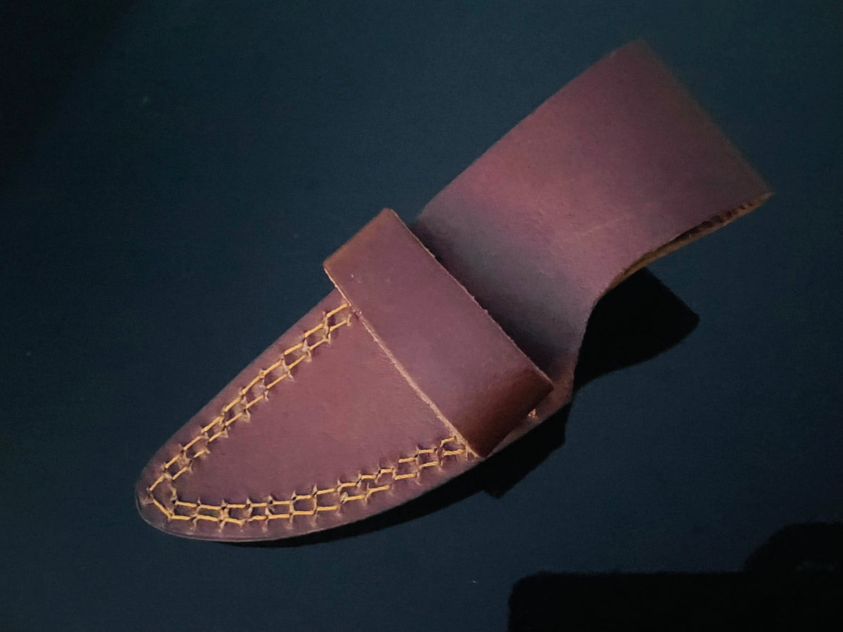 Brown leather knife sheath with yellow stitching for the TD-159X Damascus fixed blade knife on Tampa Home & Garden Store