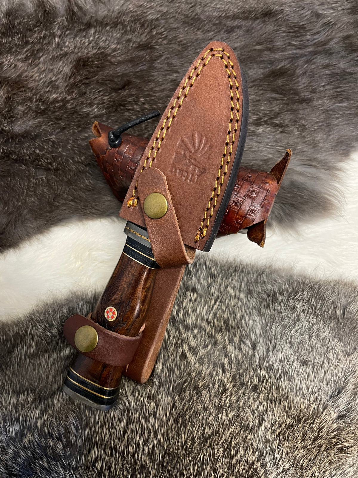 Eldertree TK-097 compact hunter's knife by Titan in brown leather sheath with yellow stitching on Tampa Home & Garden Store